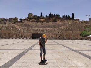 Courageous Wanderer proudly posing at the Roman Amphitheater in Amman, Jordan