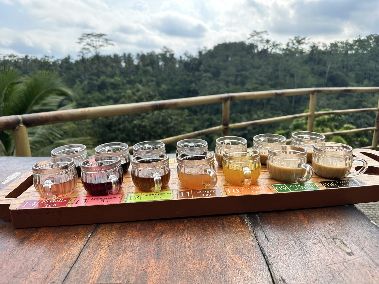 A cup of freshly brewed Kopi Luwak, served with traditional Balinese treats